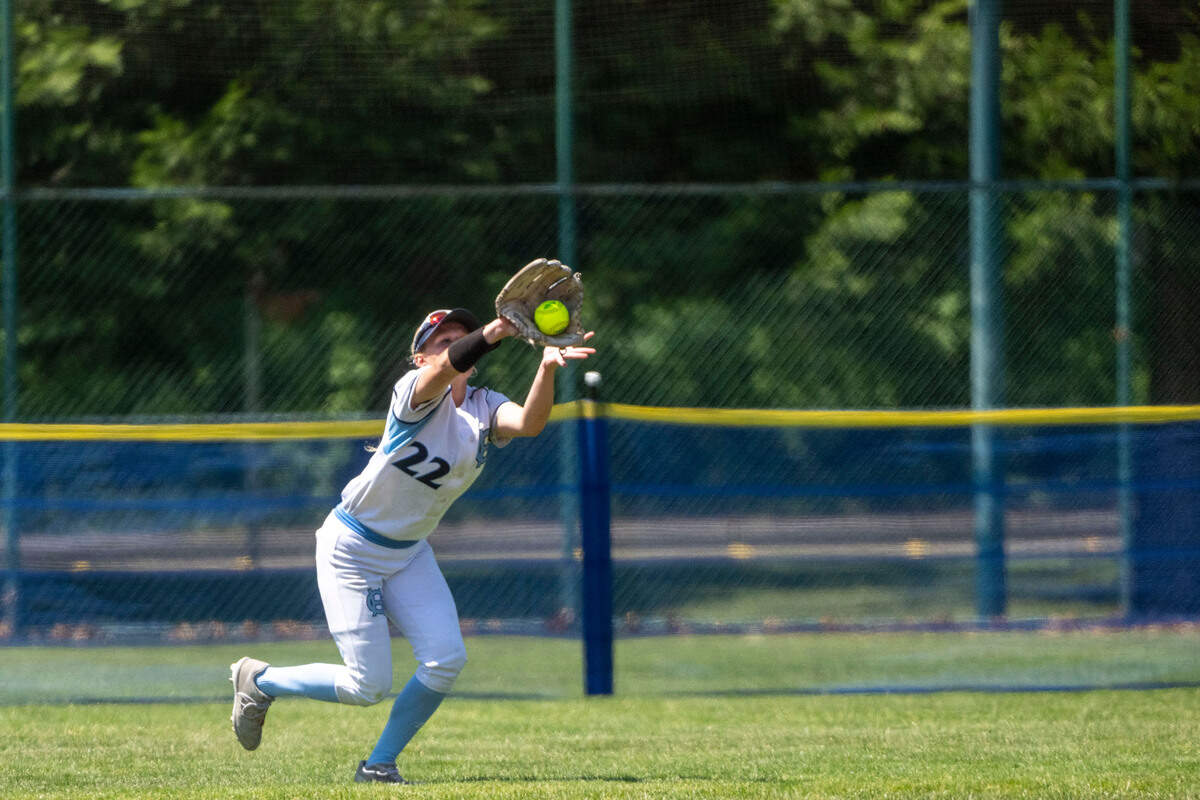 Gig Harbor centerfielder Daniel Biehl catches a Cascade line drive during a second-round game of the Class 3A state softball tournament on Friday, May 26, 2023, in Lacey, Wash.