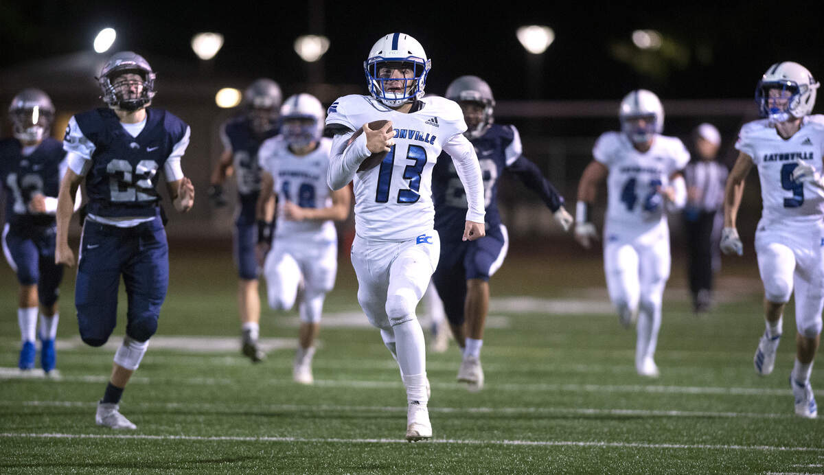 Eatonville kick returner Zach Smith speeds away from the River Ridge defense as he returns a punt for a touchdown during Friday night’s football game at South Sound Stadium in Lacey on Oct. 4, 2019.