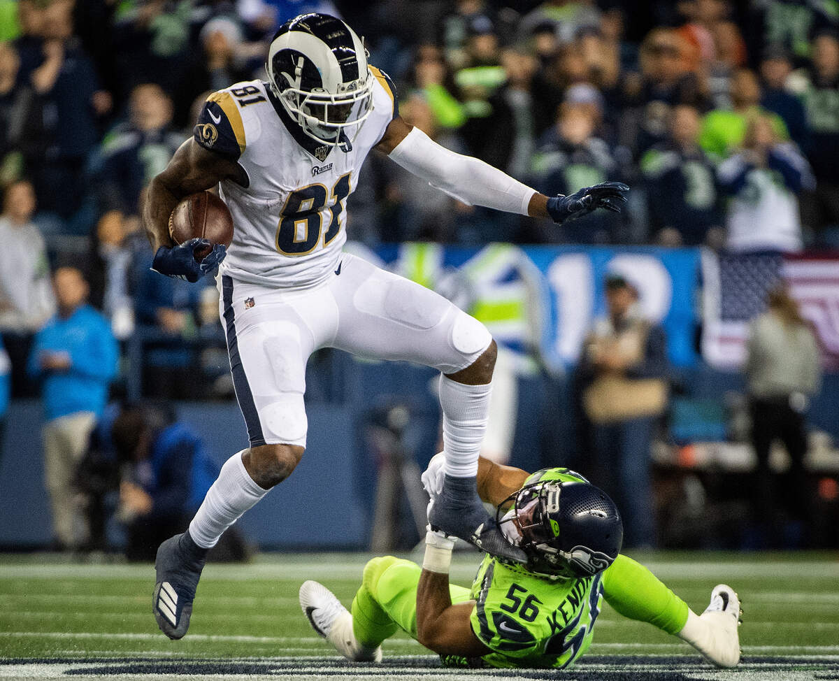 Seattle Seahawks linebacker Mychal Kendricks (56) trieas to tackle Los Angeles Rams tight end Gerald Everett (81) during the third quarter. The Seattle Seahawks played the Los Angeles Rams in a NFL football game at CenturyLink Field in Seattle, Wash., on Thursday, Oct. 3, 2019.