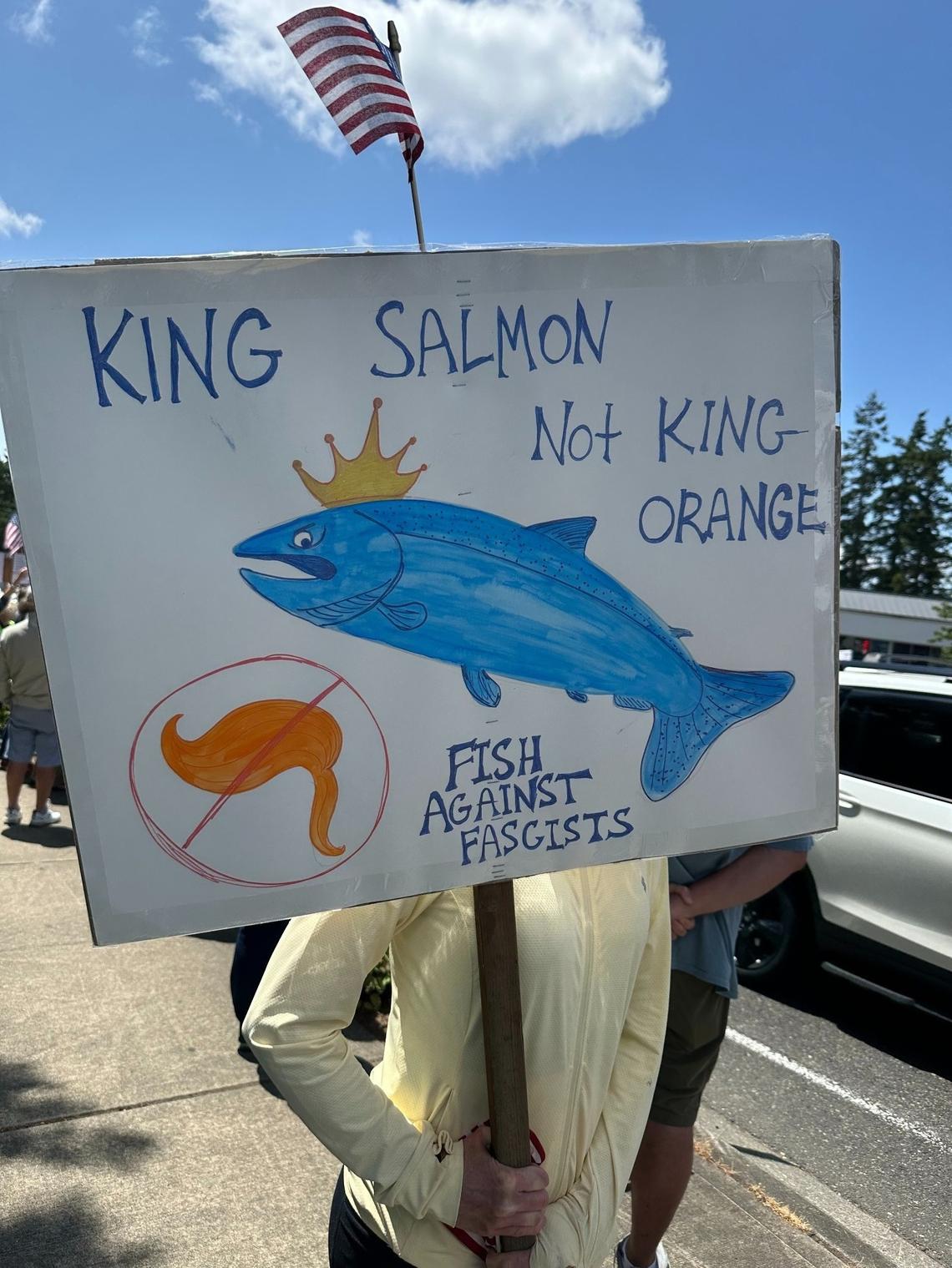 Signs with messages for the Trump administration at the No Kings event in Gig Harbor on Saturday, June 14, 2025