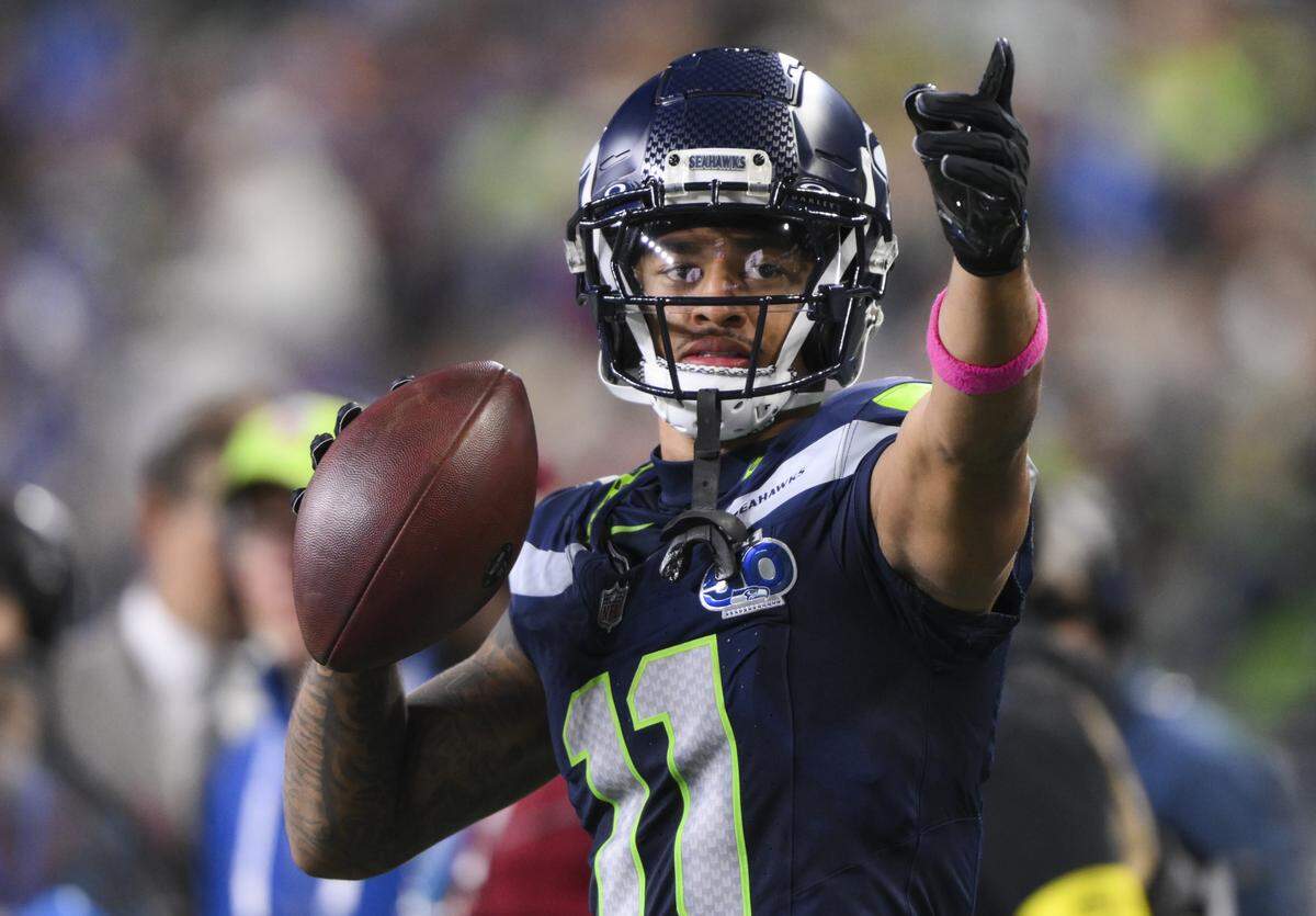 Seattle Seahawks wide receiver Jaxon Smith-Njigba (11) reacts to a 20-yard reception during the second quarter of the game against the Houston Texans at Lumen Field, on Monday, Oct. 20, 2025, in Seattle.