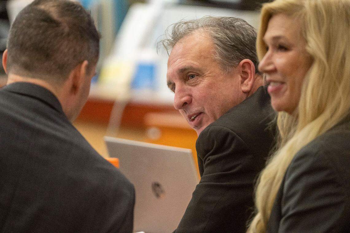 Flanked by his defense attorneys, Pierce County Sheriff Ed Troyer, in between witness testimony on Monday, Dec. 5, 2022, in Pierce County District Court in Tacoma.