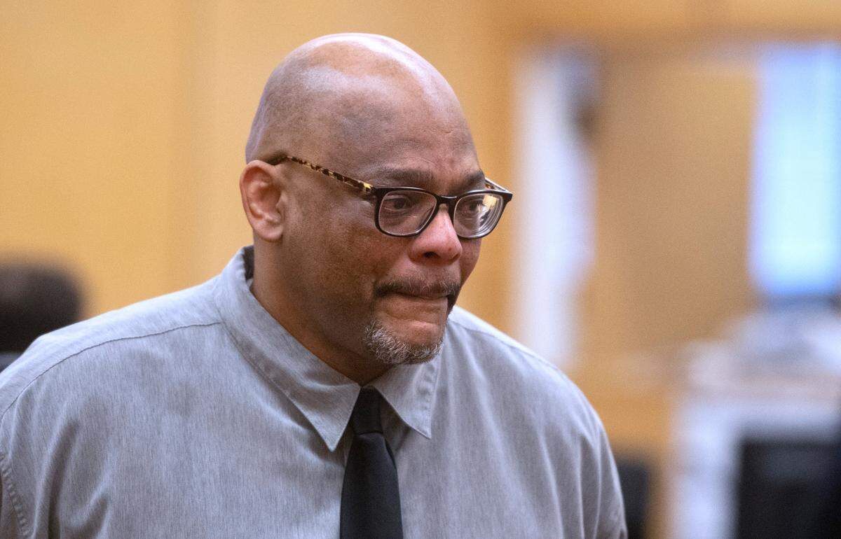 Dorcus Allen leaves Pierce County Superior Court in Tacoma, Washington, on Thursday, Feb. 16, 2023, during a break in the closing arguments in his third trial for first-degree murder charges in the killing of four Lakewood police officers in 2009.