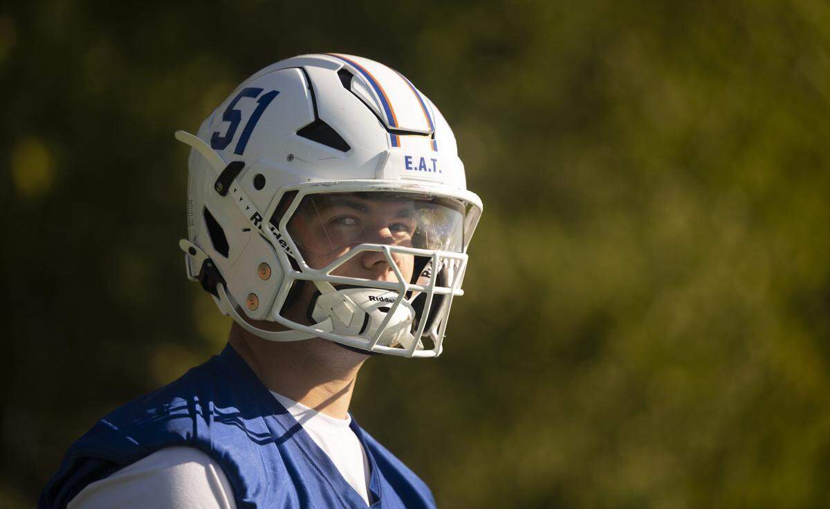 Graham-Kapowsin offensive lineman Douglas Peterson looks on during a football practice at Graham-Kapowsin High School on Friday, Aug. 22, 2025, in Graham, Wash.