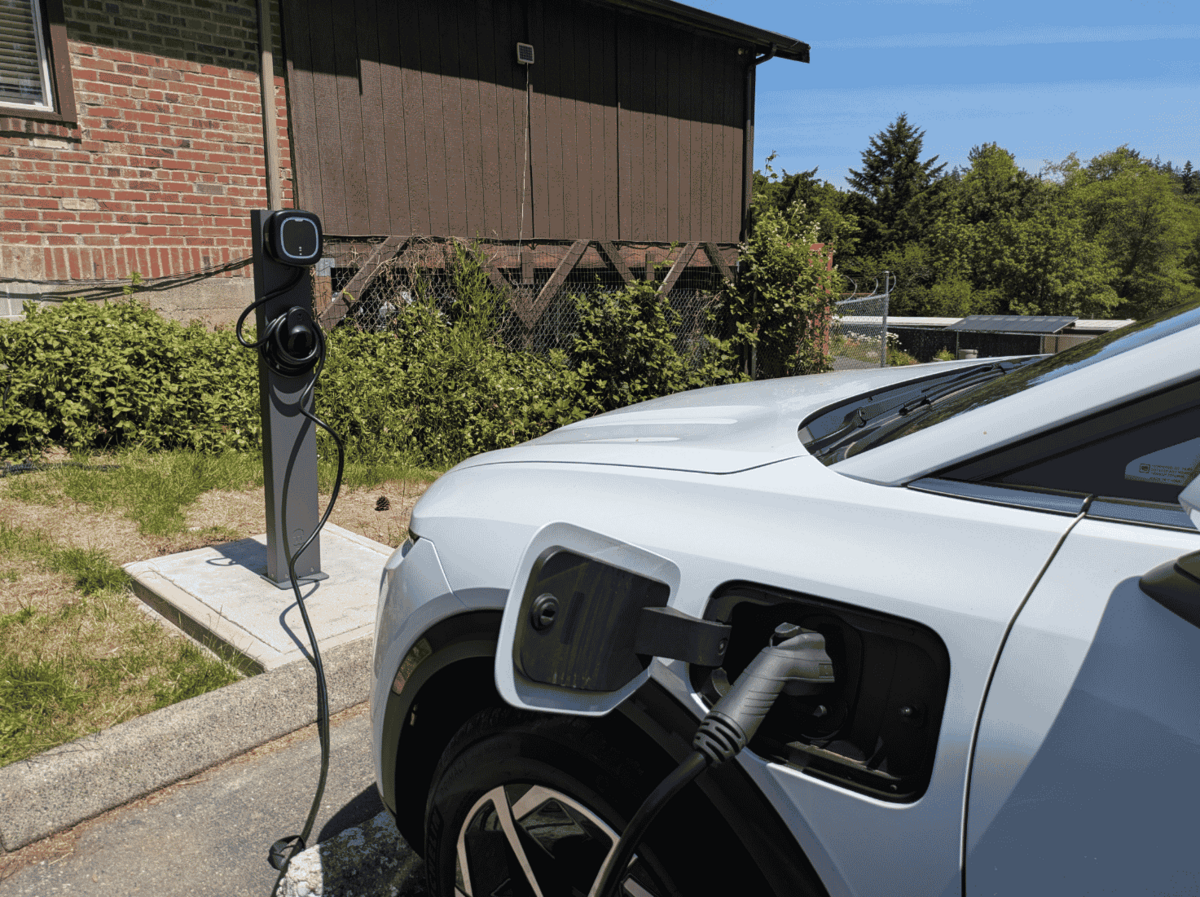 Drivers plug the electric car into a charging station at Key Peninsula Community Services when not in use.