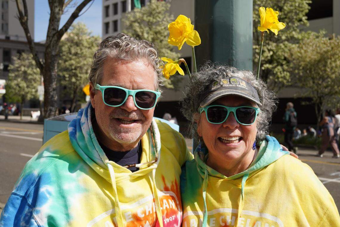 Tacoma residents Bruce Dougherty and Lydia Garcia said rain and travel plans in the past have kept them from attending the Daffodil Festival until this year, Saturday, April 5, 2025.