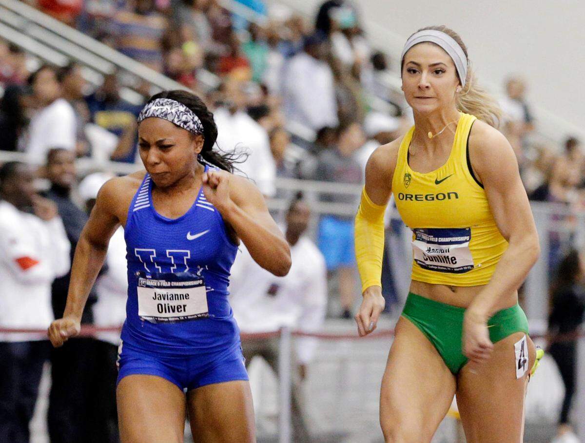 Kentucky’s Javianne Oliver is beat out by Oregon’s Hannah Cunliffe in the women’s 60 meter dash during the NCAA indoor track and field championships Saturday, March 11, 2017, in College Station, Texas. (AP Photo/Michael Wyke)