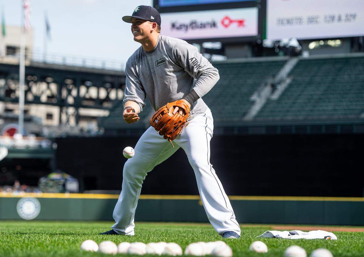 Ryon Healy warms up during Mariners Fan Fest at T-Mobile Park in Seattle, Wash., on Saturday, March 23, 2019.