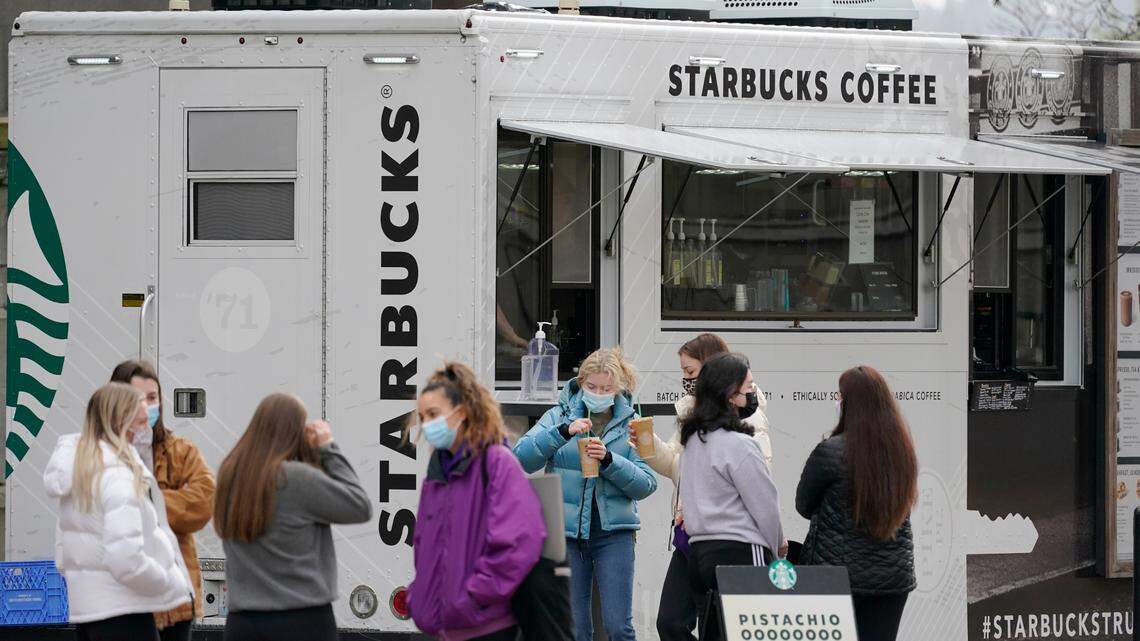 A Starbucks coffee truck continues to serve students and staff in an otherwise nearly deserted Red Square on the University of Washington campus Monday, Jan. 25, 2021, in Seattle. The city is also home to the most expensive coffee in the country.
