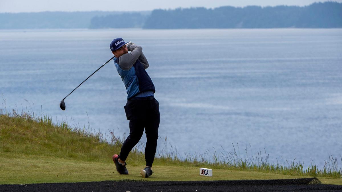 Danny Woodhead, a former running back for the New England Patriots, tees off during a practice round at Chambers Bay Golf Course in University Place on Friday, May 21, 2021. Woodhead will be competing in the U.S. Amateur Four-Ball Championship.