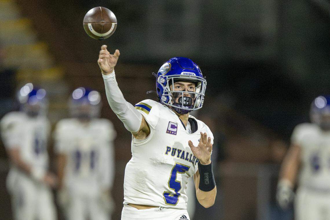 Puyallup quarterback Luke Parker (5) throws the ball during a game against Emerald Ridge on Friday, Sept. 26, 2025, in Puyallup, Wash.