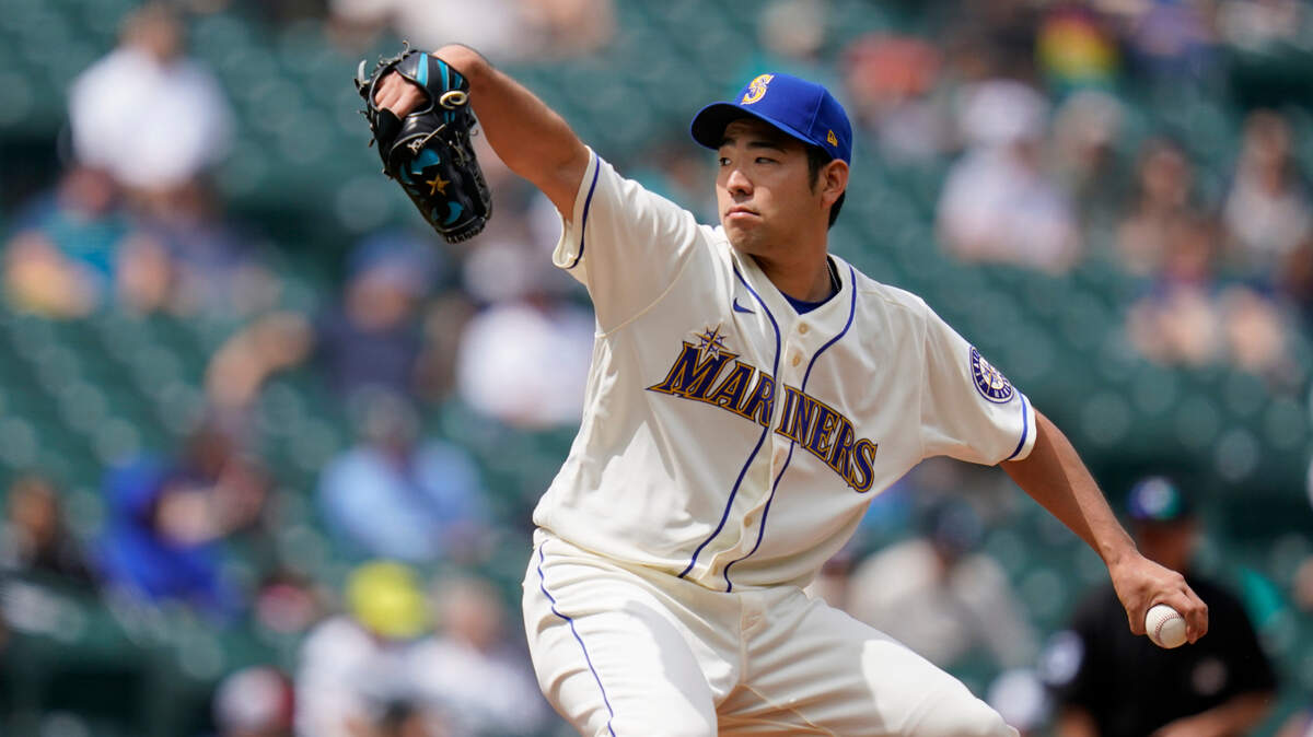 Seattle Mariners starting pitcher Yusei Kikuchi in action against the Texas Rangers in the sixth inning of a baseball game Sunday, May 30, 2021, in Seattle. (AP Photo/Elaine Thompson)