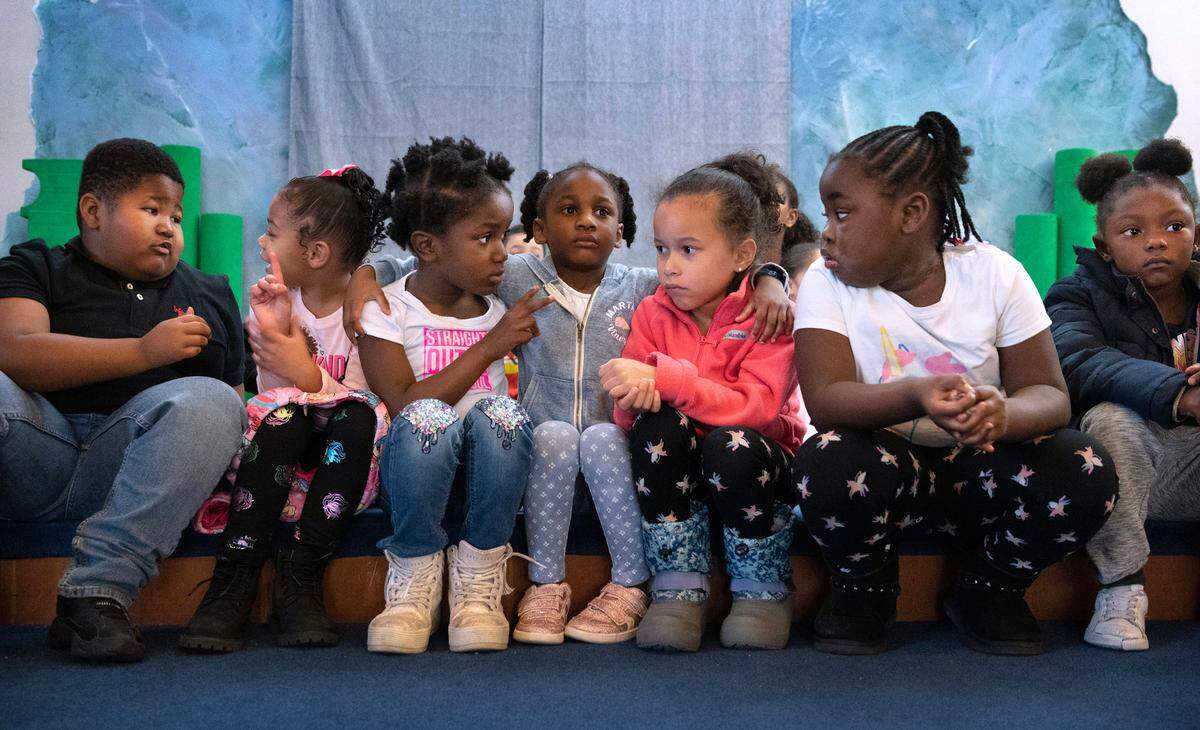 School kids gather for morning activities at the Multicultural Child and Family Hope Center’s Community Hall in the Hilltop neighborhood of Tacoma, Washington, on Wednesday, Nov. 1, 2023. The center is on a multi-million dollar capital campaign to expand their location and services.