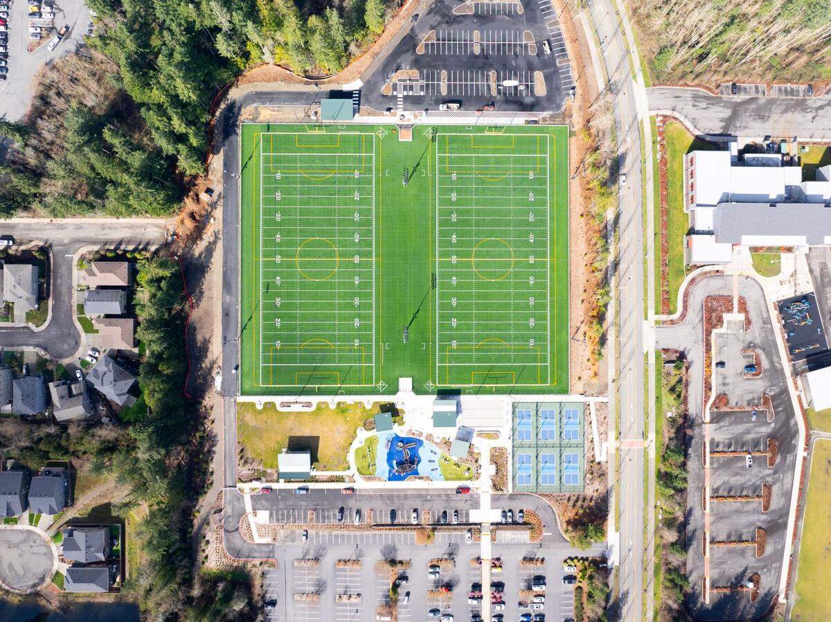 An overhead view of two new artificial turf fields that opened Monday, April 6, 2026 in Gig Harbor, Wash. The Tom Taylor Family YMCA will manage the fields under a lease agreement with the city of Gig Harbor.