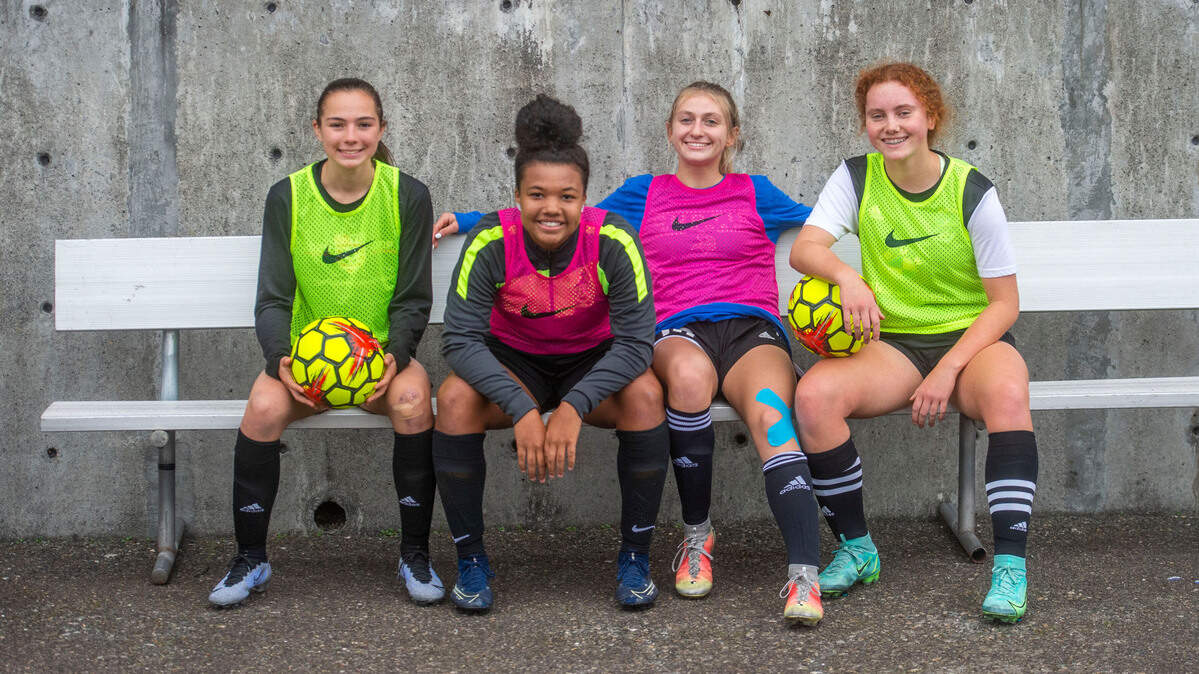 Sophia Mayne, left, KV Miller, Katie Riggins and Enya Niebergall are four reasons why the Curtis Vikings soccer team is sitting in first place in the 4A SPSL Photo taken in University Place Monday, Oct. 18. 2021.