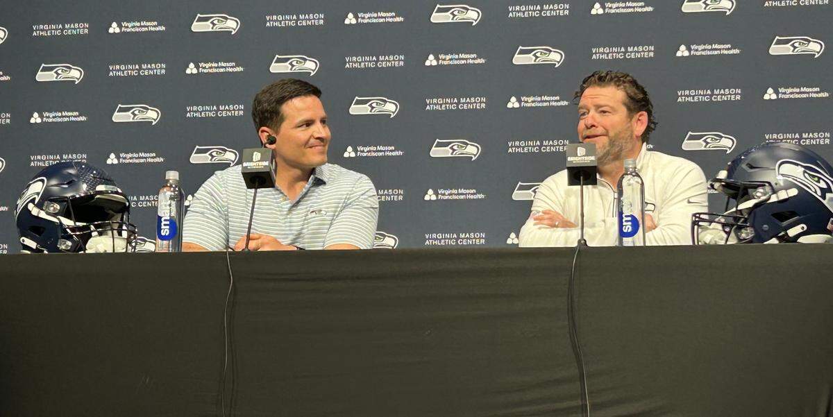 Coach Mike Macdonald (left) and general manager John Schneider talk to reporters at the Seattle Seahawks’ Virginia Mason Athletic Center in Renton April 21, 2025, three days before the start of the NFL draft.