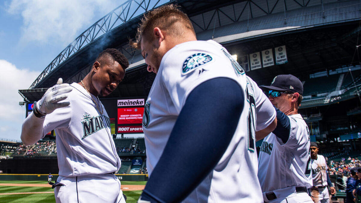 Tim Beckham celebrates with Daniel Vogelbach after his two-run home run in the fourth inning. The Seattle Mariners played the Texas Rangers in a Major League Baseball Game at T-Mobile Park in Seattle, Wash., on Wednesday, May 29, 2019. 
