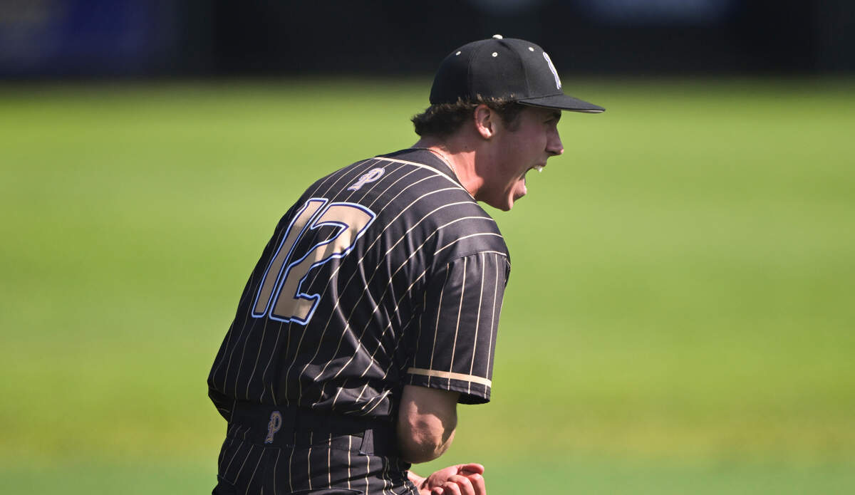 Puyallup’s Jett Reed (12) reacts to a strike out against Lake Stevens during the quarterfinal round of the 4A State tournament at Heritage Recreation Center, on Saturday, May 24, 2025, in Puyallup, Wash.