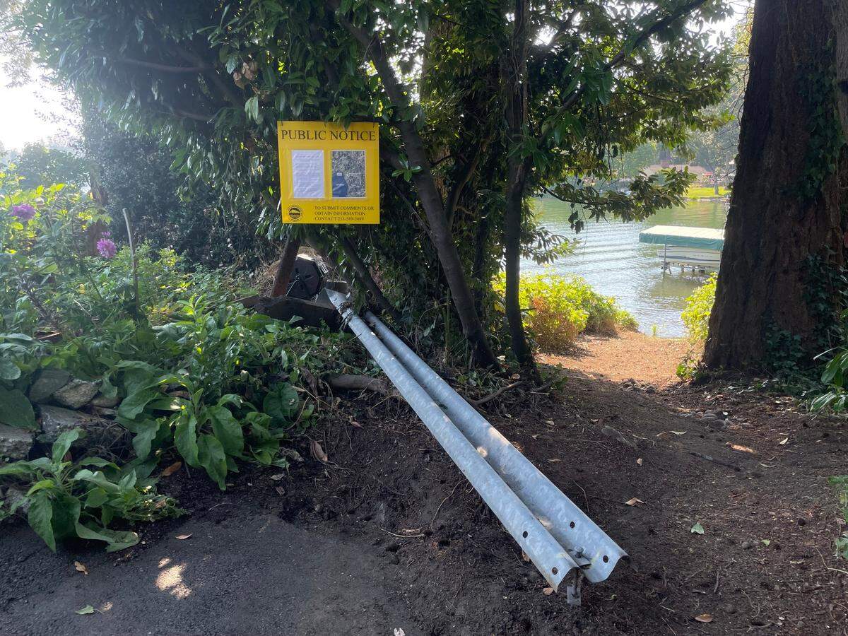 A firestorm is raging about whether Lakewood should allow neighbors to purchase a small public access point on Lake Steilacoom on 100th Street Southwest, pictured here Aug. 7, 2024.