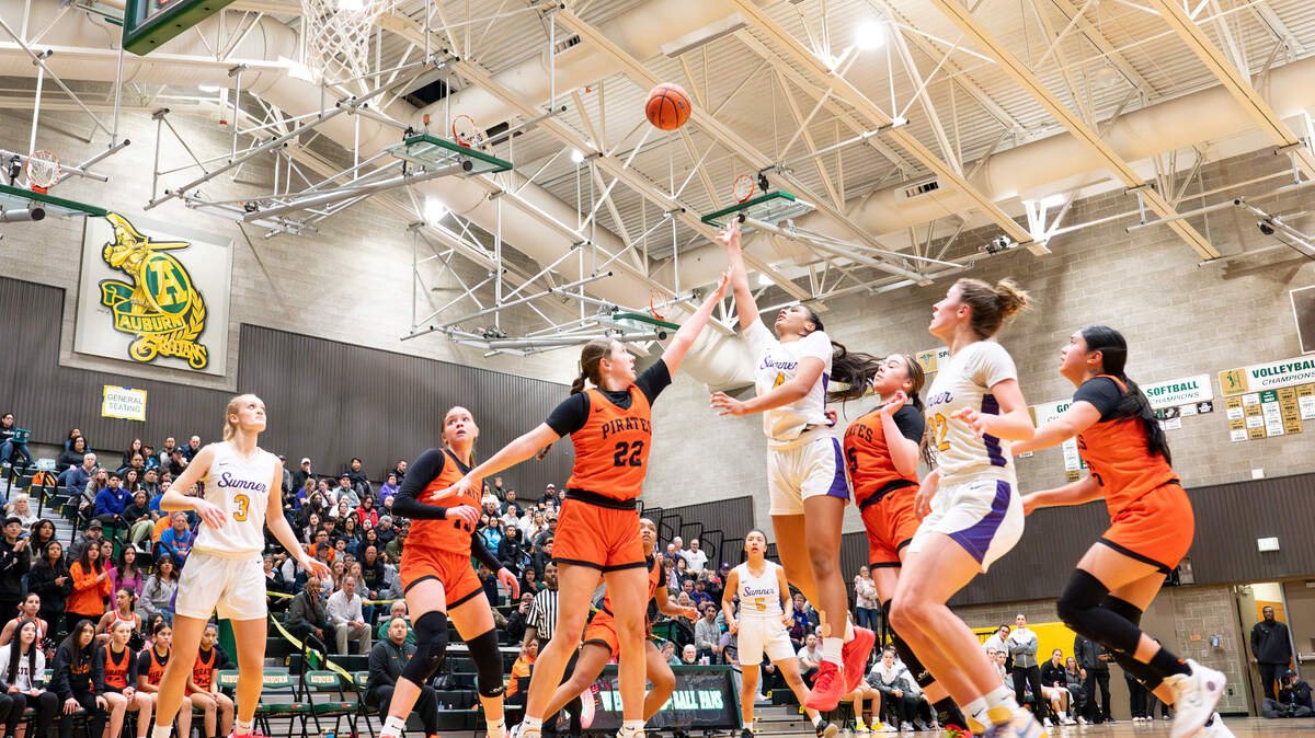 Sumner’s Kawehi Borden (4) shoots over Davis players during the 4A state regional girls game at Auburn Senior High School, on Saturday, Feb. 24, 2024 in Auburn, Washington.