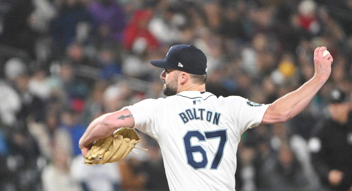 Seattle Mariners relief pitcher Cody Bolton (67) pitches against Boston Red Sox during the seventh inning of the opening day game at T-Mobile Park, on Thursday, March 28, 2024, in Seattle, Wash.