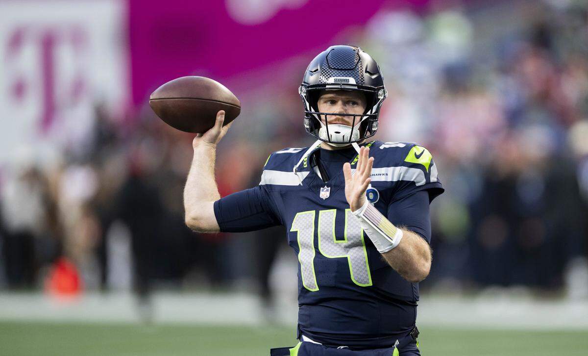 Seattle Seahawks quarterback Sam Darnold (14) warms up before the NFC Divisional Round game against the San Francisco 49ers at Lumen Field, on Saturday, Jan. 17, 2026, in Seattle.