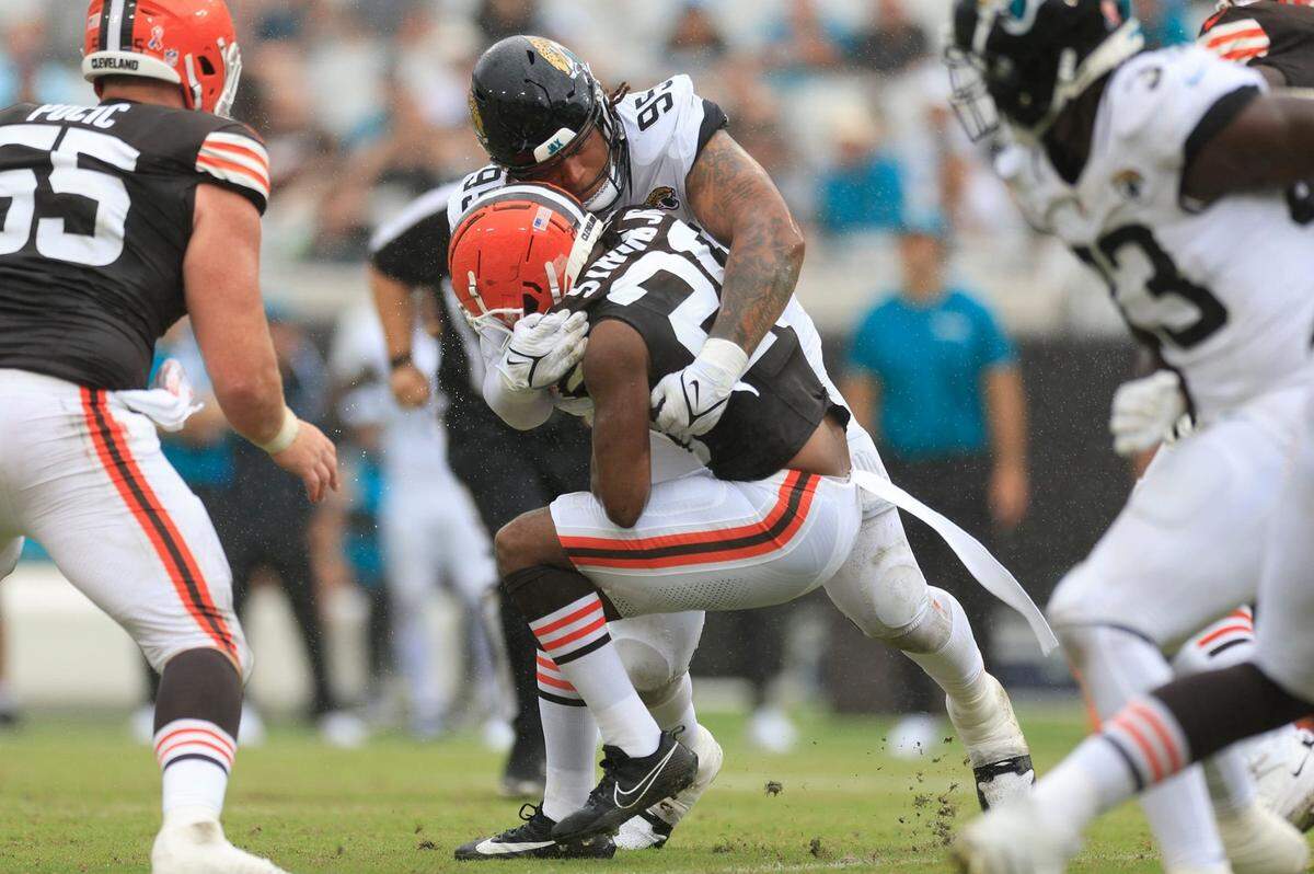Jacksonville Jaguars defensive tackle Roy Robertson-Harris (95) tackles Cleveland Browns running back Pierre Strong Jr. (20) during the second quarter of an NFL football matchup Sunday, Sept. 15, 2024 at EverBank Stadium in Jacksonville, Fla. [Corey Perrine/Florida Times-Union]