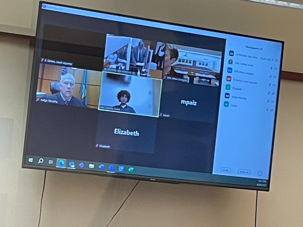 David Maldonado, 16, center, appears via Zoom for arraignment Monday, June 26, 2023 in Pierce County Superior Court to face charges of first-degree murder and second-degree unlawful possession of a firearm for a shooting inside a Lakewood house that killed a 16-year-old boy.