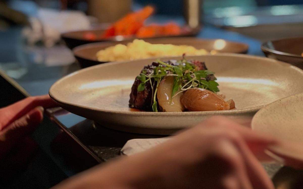Keeping with Asado’s roots and taking advantage of its wood-fired oven, Oltre features two steaks, including an 8-ounce tenderloin with roasted shallots and demi-glace.