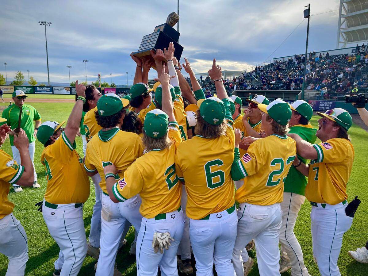 Players on the Richland High School baseball team celebrate after winning the WIAA Class 4A state high school baseball championship. The Bombers defeated the Puyallup Vikings, 4-3 at GESA Stadium in Pasco, Wash. on May 25, 2024.