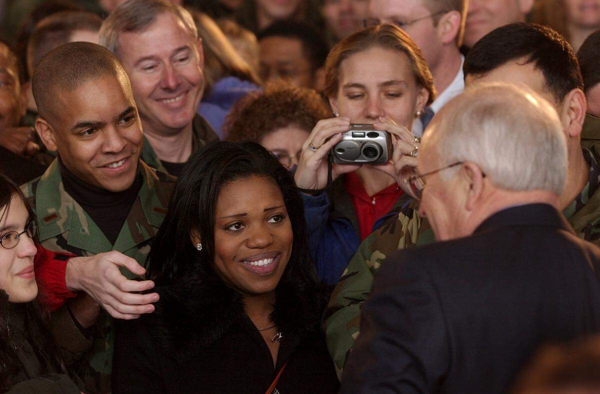 Vice President Dick Cheney greets military personnel and their families after a brief speech during his visit to McChord Air Force base.