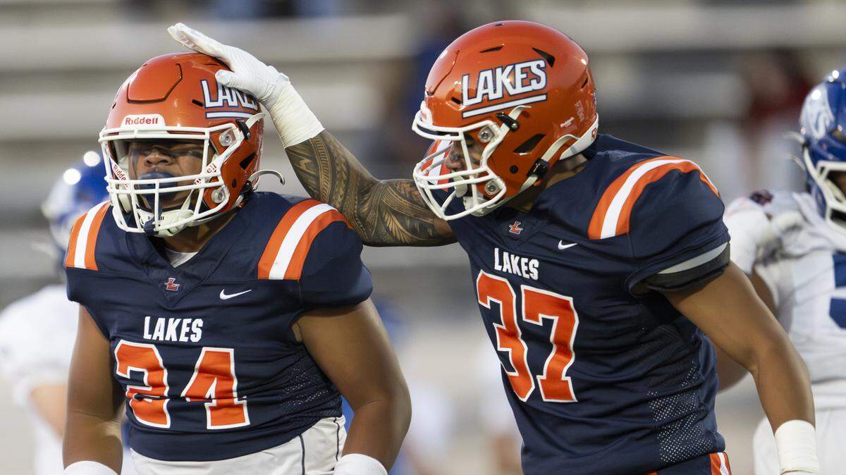 Lakes defensive back Romiece Taviumi (24) reacts to a sack on Curtis quarterback Samuel Patterson (2) during the first half of the game at Harry Lang Stadium, on Friday, Sept. 19, 2025, in Lakewood, Wash.