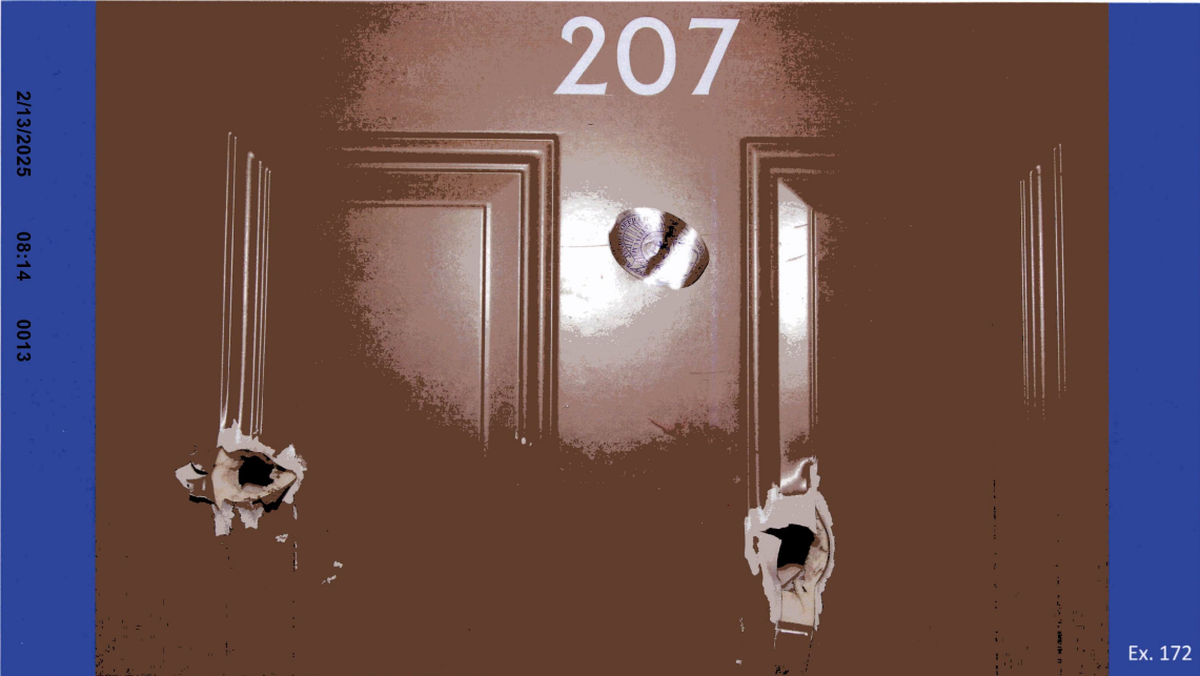 A photograph included in prosecutors’ PowerPoint used in closing arguments in the trial of Muelu Salanoa Jr. shows the door Salanoa shot through when he struck and injured Puyallup Police Department officers on Jan. 24, 2023.