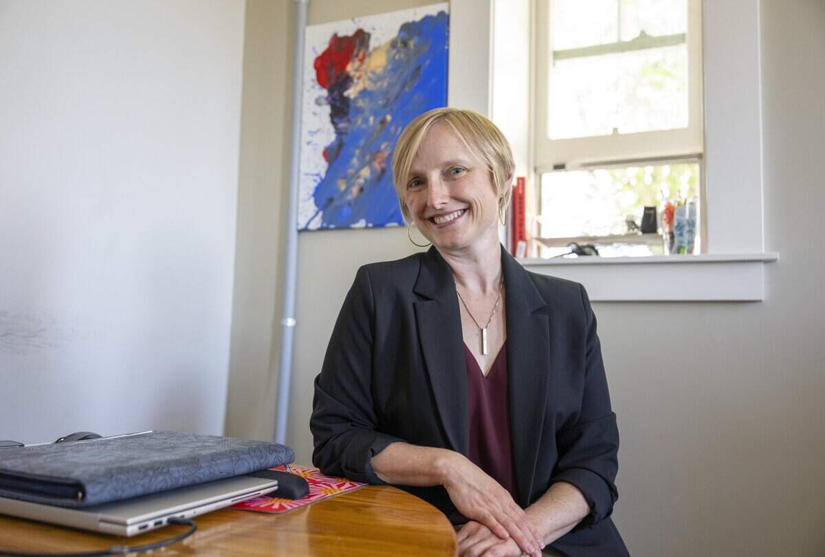 Katie Stricker, the new chief executive officer of Tacoma Arts Live, sits for a portrait in her office on Wednesday, July 29, 2026, in Tacoma, Wash.