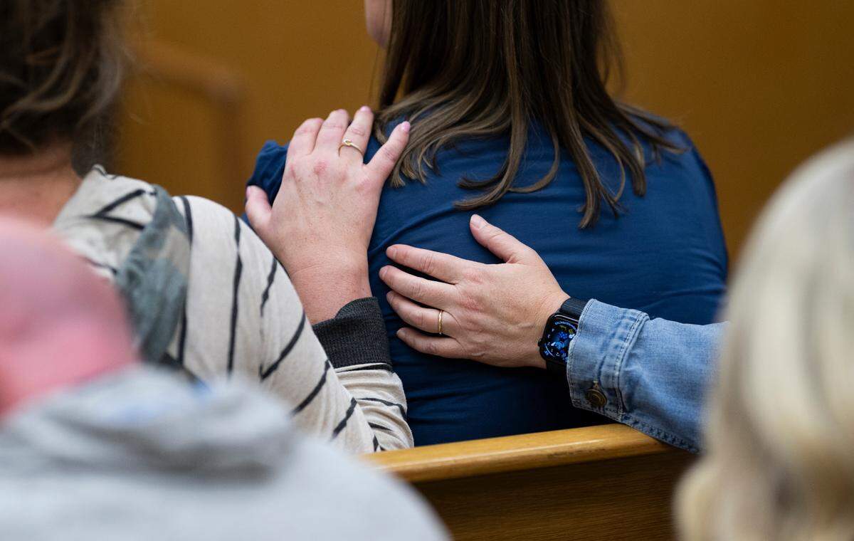 Members of the gallery console each other as the guilty verdicts are read by Judge Philip Sorensen in the sexual abuse trial of Jacob “Jake” Jackson, former Sumner High School coach, of his players, at Pierce County Superior Court, on Thursday, Jan. 30, 2025, in Tacoma Wash.