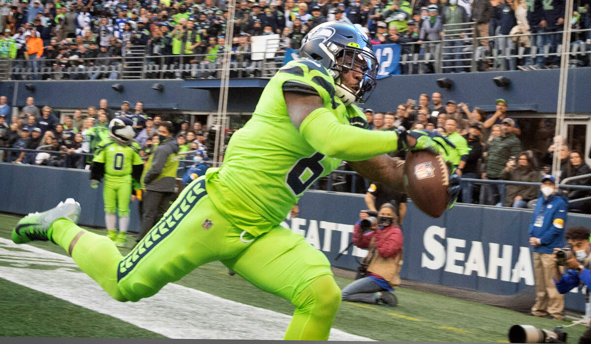 Seattle free safety Quandre Diggs intercepts a Los Angeles Rams pass in the back of the end zone during the NFL’s Thursday Night Football game at Lumen Field in Seattle, Washington, on Oct. 7, 2021.