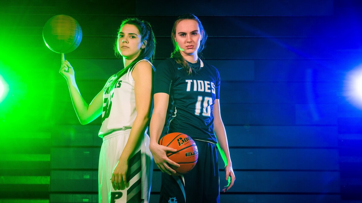 Peninsula’s Belle Frazier, left, and Gig Harbor’s Brynna Maxwell, right, photographed at Gig Harbor High School in Gig Harbor, Wash., on Wednesday, Jan. 23, 2019. Both have signed with Division I programs - Maxwell with Utah, Frazier with Portland State.