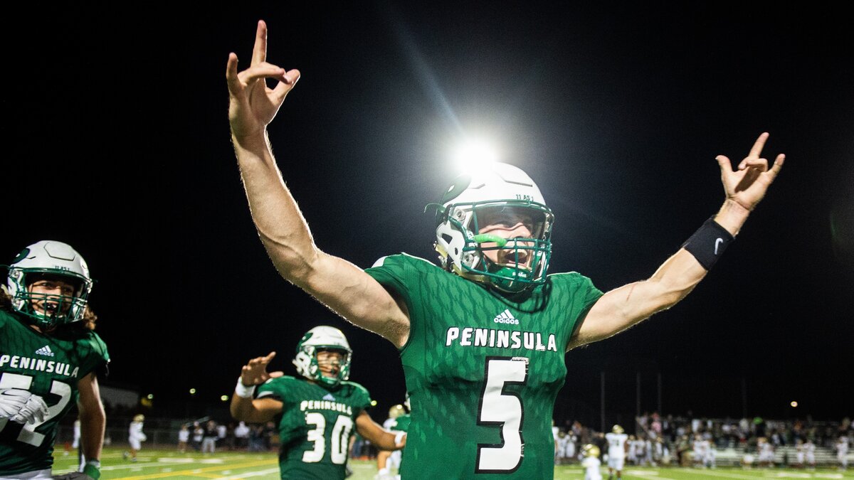 Peninsula’s Burke Griffin (5) celebrates after a failed two-point conversion by Timberline in overtime to give the Seahawks a 28-27 win. Peninsula High School played Timberline High School in a football game at Roy Anderson Field in Purdy, Wash., on Thursday, Sept. 27, 2018.