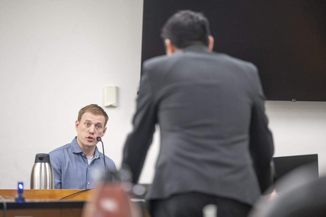 Jordan Henderson, a former teacher at Evergreen Elementary School, is cross-examined during his trial on Monday, Dec. 29, 2025, at Pierce County Superior Court in Tacoma, Wash. Henderson, 36, has been charged with 12 counts of first-degree child molestation.