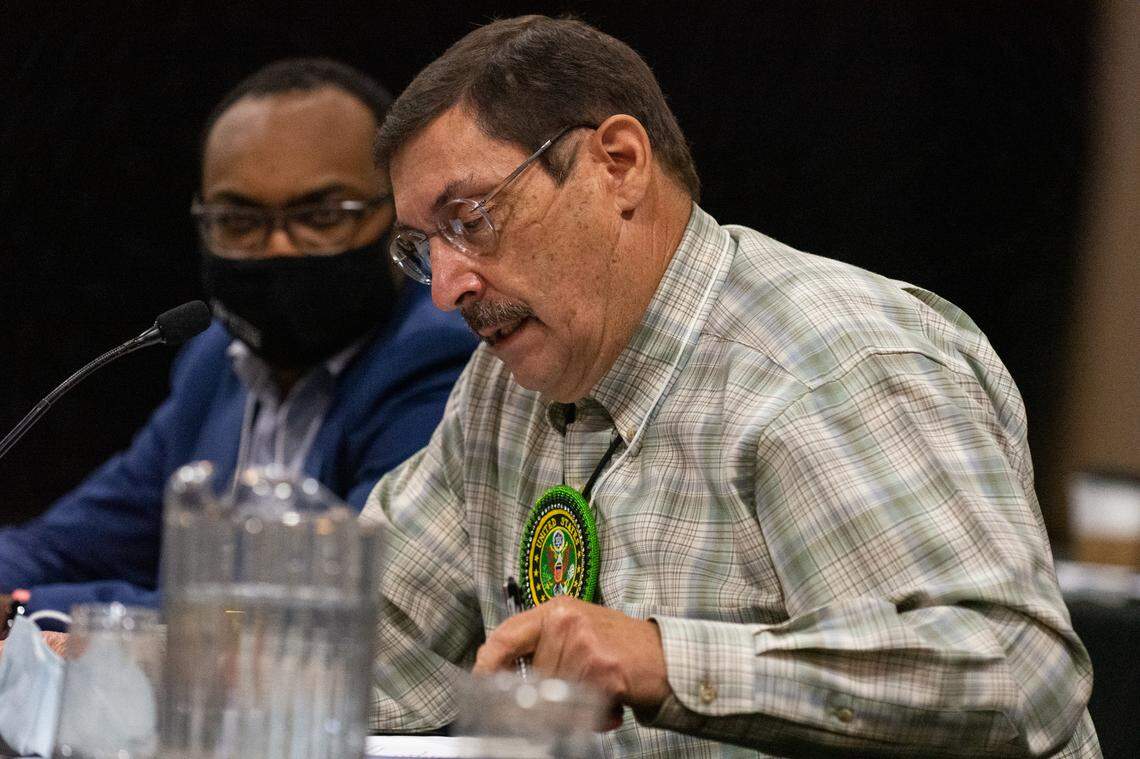 Suquamish Tribe Health Clinic Manager and American Indian Health Commission Chair Stephen Kutz, right, discusses Native health initiatives at the 32nd Annual Centennial Accord Meeting Wednesday, Oct. 27, at the Skookum Creek Event Center in Shelton, Wash. Kutz alleged an alarming trend in law enforcement officers not responding to mental health crises on the reservation following the passage of HB 1310 that focused on law enforcement use of force. Gov. Jay Inslee said this was particularly alarming information and reiterated that the 11 bills he signed this year to reduce police-citizen violence did not prohibit officers from responding to these scenes.