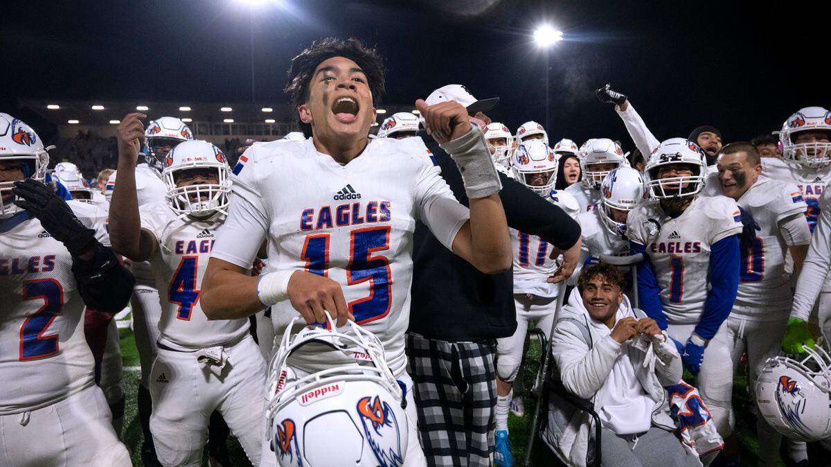 Graham-Kapowsin quarterback Daveon Superales and the Eagles celebrate their 28-21 victory over the Sumner Spartans in Friday night’s 4A football state quarterfinal game at Sunset Chev Stadium in Sumner, Washington, Nov. 18, 2022.