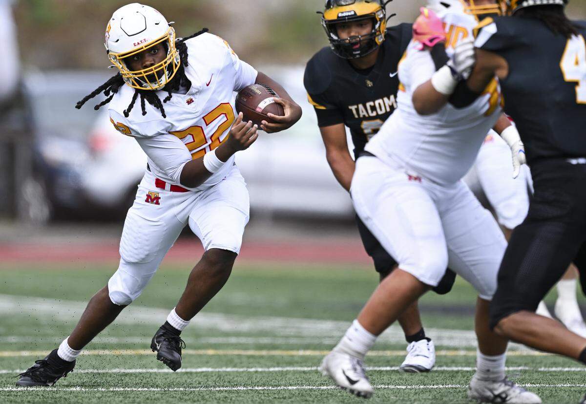 Mount Tahoma running back Keshawn Hines (22) carries the ball during the first half of the game against the Lincoln Abes at Lincoln High School, on Saturday, Oct. 4, 2025, in Tacoma, Wash.