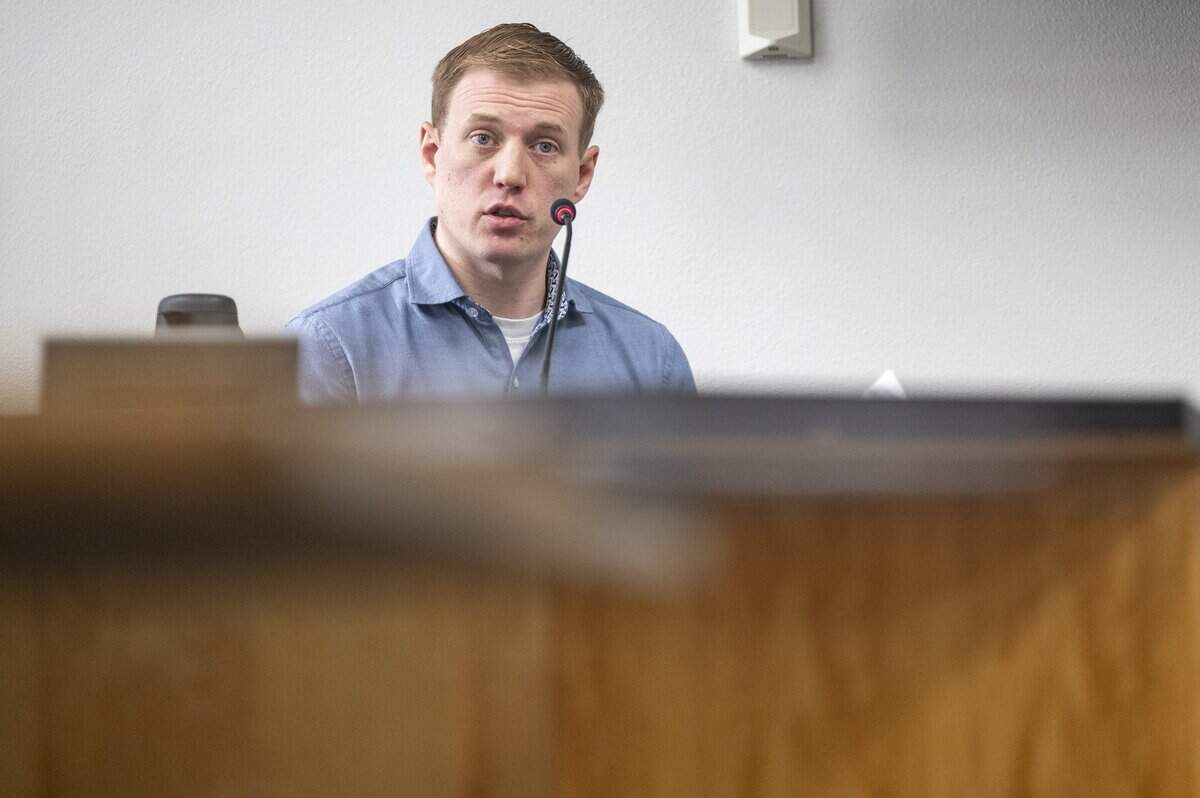 Jordan Henderson, a former teacher at Evergreen Elementary School, takes the stand during his trial on Monday, Dec. 29, 2025, at Pierce County Superior Court in Tacoma, Wash. Henderson, 36, has been charged with 12 counts of first-degree child molestation.