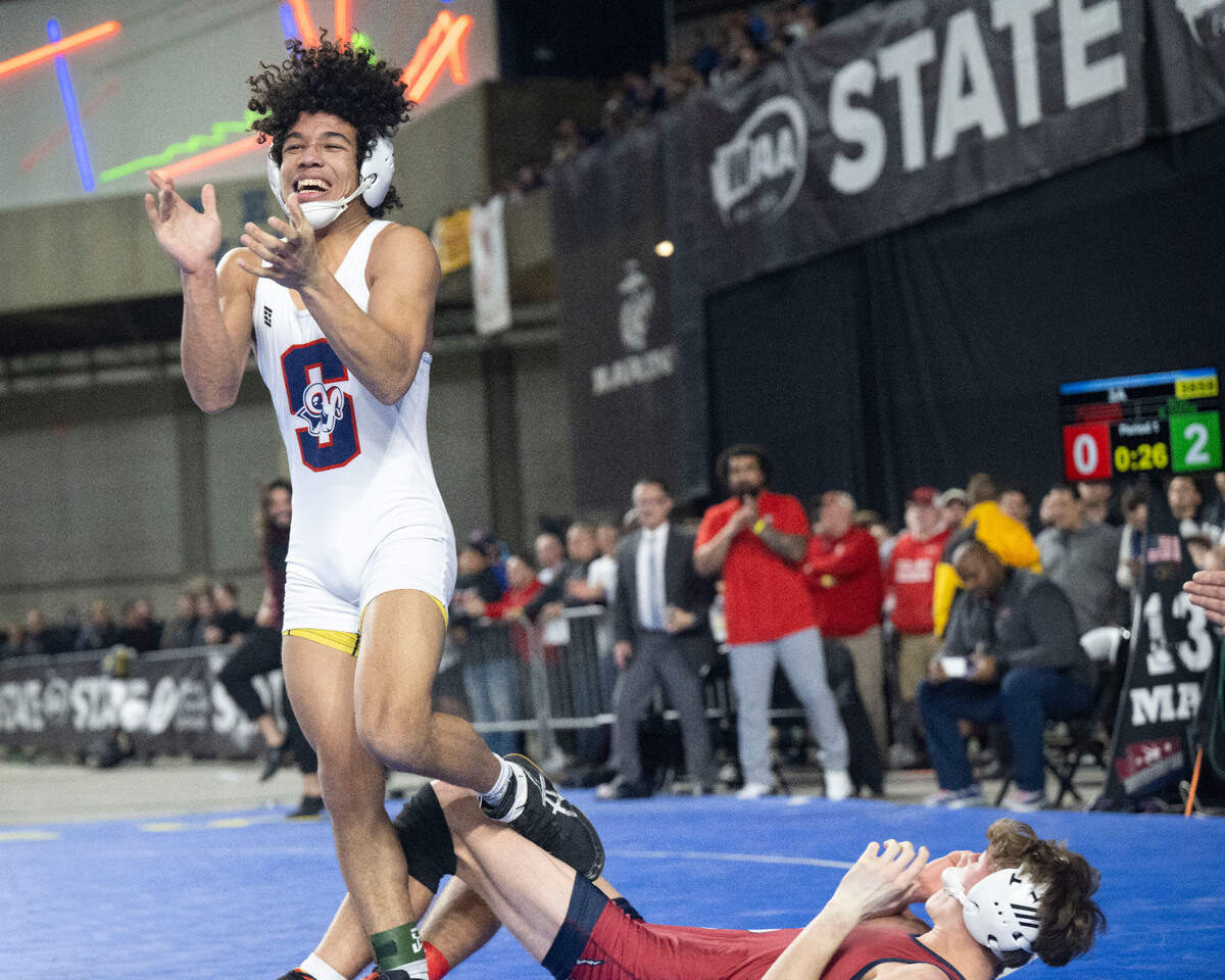 Silas’ Elijah Cater celebrates after pinning Mount Spokane’s Jayson Bonnett in the 126-pound, Class 3A championship match at Mat Classic XXXIV on Saturday, Feb. 18, 2023, at the Tacoma Dome in Tacoma, Wash. Cater pinned Bonnett in 1 minute, 34 seconds.