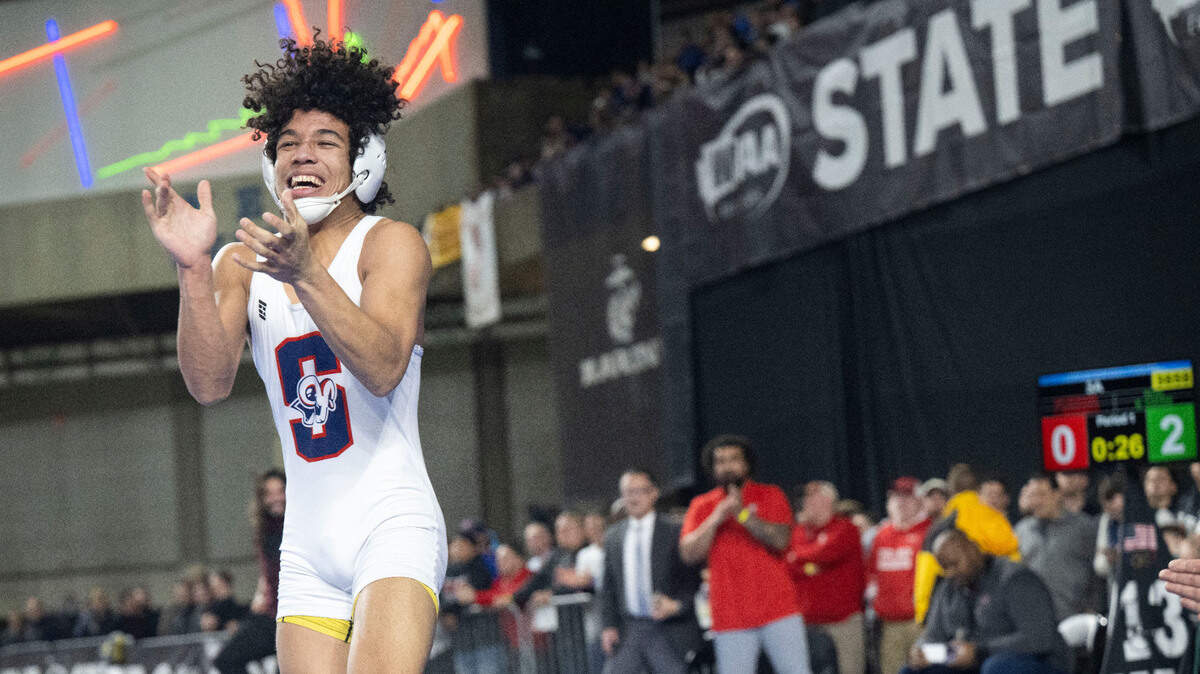 Silas’ Elijah Cater celebrates after pinning Mount Spokane’s Jayson Bonnett in the 126-pound, Class 3A championship match at Mat Classic XXXIV on Saturday, Feb. 18, 2023, at the Tacoma Dome in Tacoma, Wash. Cater pinned Bonnett in 1 minute, 34 seconds.