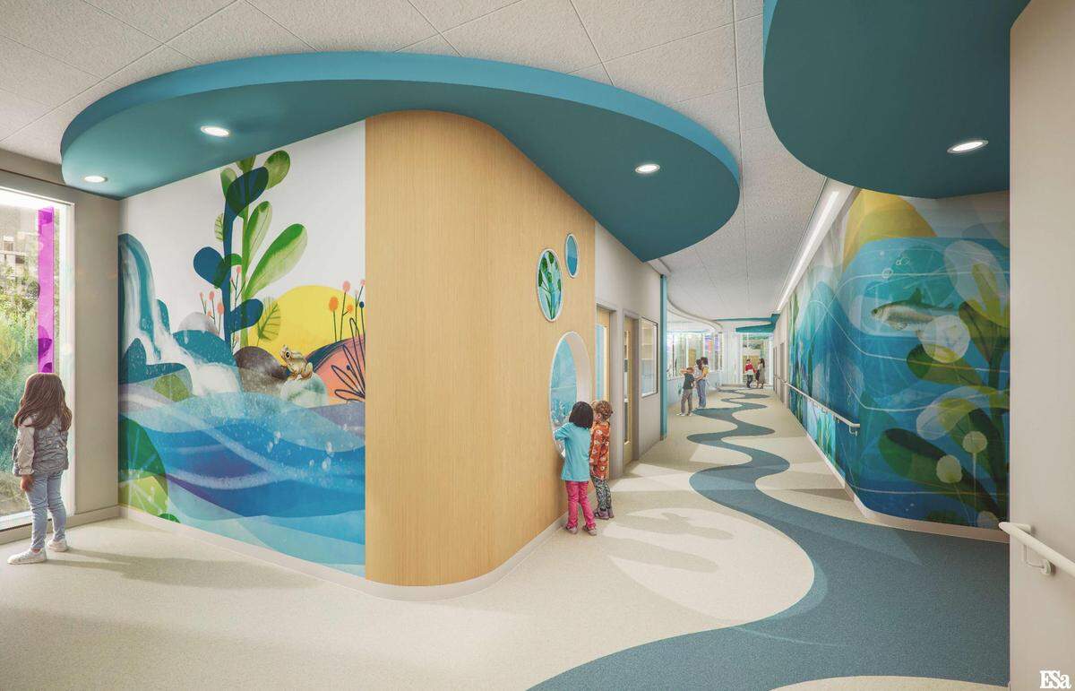 This image provided by MultiCare/Mary Bridge shows how children can watch a “kitten” scanner at work simulating a CT scan procedure, except the “scanned” patient is a stuffed animal.