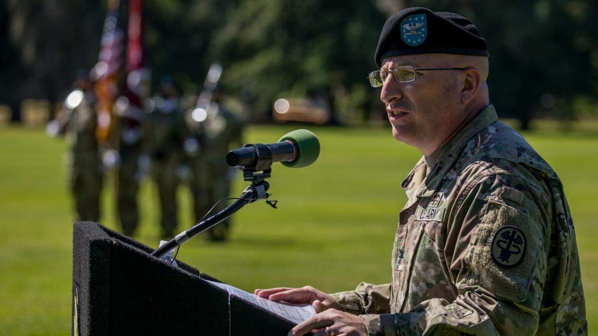 Col. Christopher Warner speaks at a change of command ceremony on Wednesday, July 15, 2020 at Joint Base Lewis-McChord.