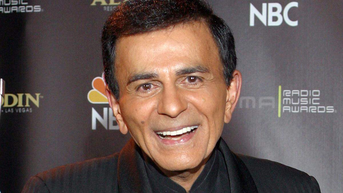 FILE - In this Oct. 27, 2003, file photo, Casey Kasem poses for photographers after receiving the Radio Icon award during The 2003 Radio Music Awards at the Aladdin Resort and Casino in Las Vegas. Three of Kasem’s children sued their father’s widow, Jean Kasem, on Wednesday, Nov. 25, 2015, for wrongful death, elder abuse and intentional infliction of emotional distress, claiming her actions shortened the popular radio personality’s life.