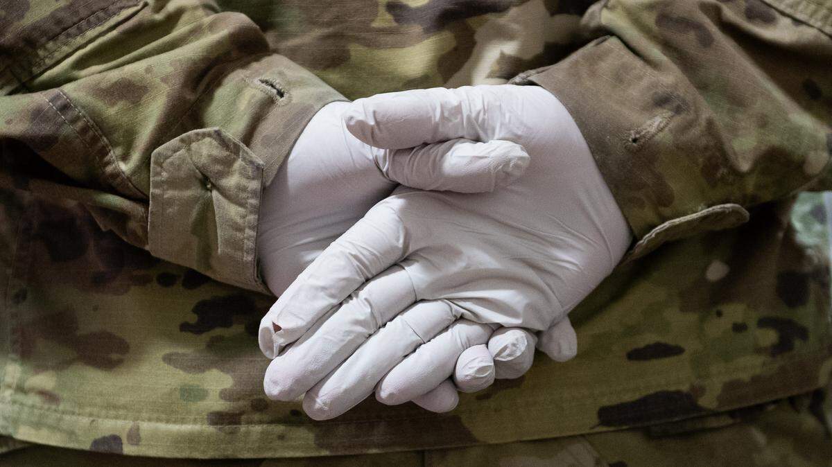 A member of the Washington National Guard stands at attention.