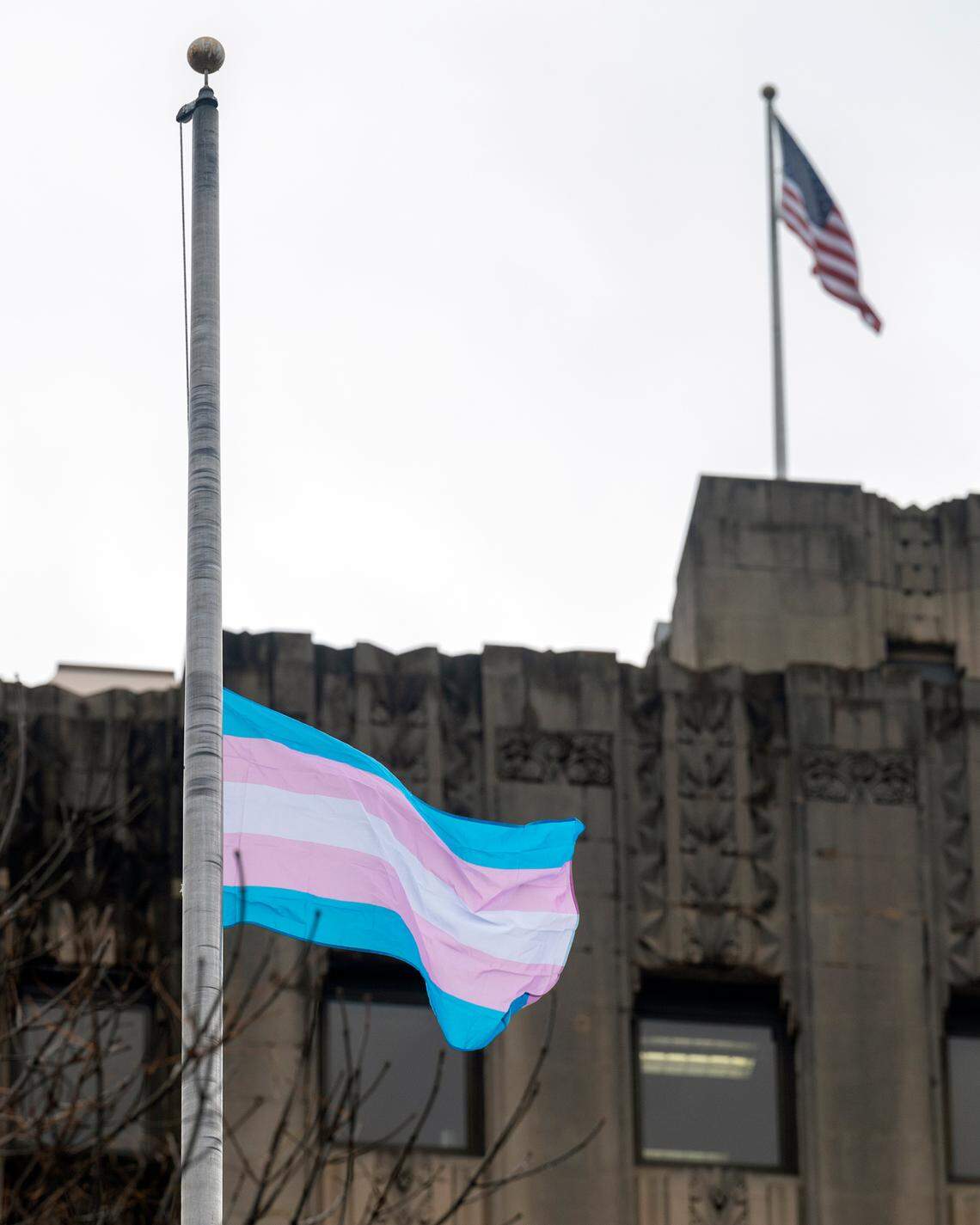 The Transgender Pride Flag is seen flying at half staff in honor on the people who have died because of violence directed at transgender individuals.